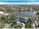 Beautiful lakefront property, including a screened-in pool and circular drive at 28 Dominica Dr, Englewood, FL 34223