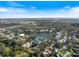 An aerial view showcases the community's layout amidst lakes and lush greenery at 28 Dominica Dr, Englewood, FL 34223