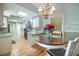 Bright kitchen nook offering custom cabinets, natural light and seamless flow to the gourmet kitchen at 28 Dominica Dr, Englewood, FL 34223