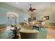 Spacious living room boasts natural light, stylish furnishings, and a welcoming ambiance at 28 Dominica Dr, Englewood, FL 34223