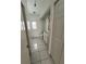 Bathroom featuring bright white cabinets, tile floors, and modern fixtures at 3722 S Cranberry Blvd, North Port, FL 34286