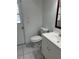 Bathroom featuring a white vanity with a toilet, and tile floors at 3722 S Cranberry Blvd, North Port, FL 34286