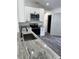 Kitchen features granite countertops, stainless steel range, and black fixtures at 3722 S Cranberry Blvd, North Port, FL 34286