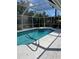 Screened-in pool area offers a tranquil view and outdoor enjoyment at 3722 S Cranberry Blvd, North Port, FL 34286