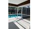 Screened pool area is perfect for outdoor relaxation at 3722 S Cranberry Blvd, North Port, FL 34286
