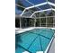 Inviting pool with screen enclosure, creating a serene and private outdoor oasis at 3722 S Cranberry Blvd, North Port, FL 34286