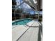 Relax in the screened-in pool with clear blue water at 3722 S Cranberry Blvd, North Port, FL 34286