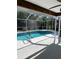 Relaxing screened patio area and pool, perfect for lounging and entertaining at 3722 S Cranberry Blvd, North Port, FL 34286