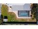 Aerial view showcasing the screened-in pool, backyard, and the property's boundaries, with the yard at 4210 Pandora Rd, Venice, FL 34293