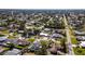 Residential neighborhood showcasing a variety of single-Gathering homes, mature trees, and well-maintained streets at 4210 Pandora Rd, Venice, FL 34293