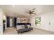 Open-concept living room featuring modern kitchen finishes, sleek flooring, and plenty of natural light at 4210 Pandora Rd, Venice, FL 34293