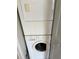 Convenient stacked washer and dryer unit maximizing space and laundry efficiency at 435 30Th W Ave # D303, Bradenton, FL 34205