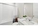 Bright bathroom features a large bathtub, shower, and vanity sink at 44325 Saddlewood Ct, Punta Gorda, FL 33982