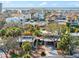 Aerial view of homes, with mature trees and landscaping in a coastal community at 4710 Gleason Ave, Sarasota, FL 34242
