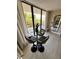 Balcony features stunning waterfront views, a glass-top table and seating for four at 500 N Osceola Ave # 203, Clearwater, FL 33755