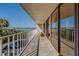 Exterior balcony with a beautiful view of the open water and bridge at 500 N Osceola Ave # 203, Clearwater, FL 33755