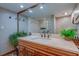Bathroom featuring a spacious vanity with quartz countertops and ample lighting at 500 N Osceola Ave # 203, Clearwater, FL 33755