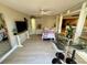 Open concept bedroom with a glass table for dining and an interior view at 500 N Osceola Ave # 203, Clearwater, FL 33755