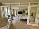 Bright bedroom with balcony access, a barn door and stylish furniture at 500 N Osceola Ave # 203, Clearwater, FL 33755