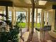 Beautiful landscaping with palm trees and green lawns leading to water views at 500 N Osceola Ave # 203, Clearwater, FL 33755