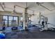 Well-equipped gym with modern exercise equipment and a beautiful view of the water at 500 N Osceola Ave # 203, Clearwater, FL 33755