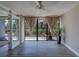 Bright and airy living room featuring sliding doors to a balcony at 500 N Osceola Ave # 203, Clearwater, FL 33755