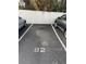 Designated parking space marked with the number 92 at 500 N Osceola Ave # 203, Clearwater, FL 33755