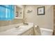 Well-lit bathroom features a clean white sink, vanity, and toilet at 5308 39Th W Ave, Bradenton, FL 34209