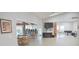 Inviting clubhouse interior boasts ample seating, neutral paint, updated flooring and versatile space for activities at 5714 Garden Lakes Fern, Bradenton, FL 34203