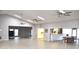 Spacious clubhouse interior with vaulted ceilings, ceiling fans, neutral paint, and updated flooring throughout at 5714 Garden Lakes Fern, Bradenton, FL 34203
