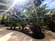 Bright and airy screened lanai with lush landscaping creates a tranquil outdoor oasis at 5714 Garden Lakes Fern, Bradenton, FL 34203