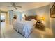 Comfortable bedroom with natural light, ceiling fan, and neutral decor at 5714 Garden Lakes Fern, Bradenton, FL 34203