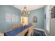 Serene dining room features natural light, comfortable seating, and stylish decor at 6114 Misty Oaks St, Sarasota, FL 34243