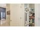 Hallway storage closet to store cleaning supplies and other household items at 6114 Misty Oaks St, Sarasota, FL 34243