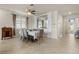 Bright and airy dining area with a large table, comfortable chairs, and plenty of natural light at 6560 Willowshire Way, Bradenton, FL 34212