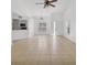 Spacious living area with tile floors, an open kitchen view, and ample natural light at 6639 Pineview Ter # 6639, Bradenton, FL 34203