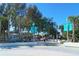 Entrance to Siesta Beach with signage and well-maintained walkways, providing easy access to the beach at 732 Siesta Dr, Sarasota, FL 34242