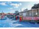 Outdoor dining at waterfront seafood restaurant with picnic tables, umbrellas and vibrant atmosphere at 732 Siesta Dr, Sarasota, FL 34242