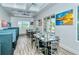 Bright dining area featuring ample natural light, modern decor, and comfortable seating for enjoyable meals at 7649 Quinto Dr, Sarasota, FL 34238