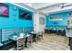 Inviting dining room with comfortable seating, contemporary decor, and a relaxed ambiance for memorable meals at 7649 Quinto Dr, Sarasota, FL 34238