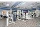 Community gym featuring weightlifting equipment, machines, and fans at 8300 Jesolo Ln, Sarasota, FL 34238