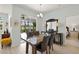 Dining area with access to screened patio for indoor-outdoor living at 8956 Stone Harbour Loop, Bradenton, FL 34212
