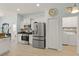 Spacious kitchen with stainless steel appliances and easy access to laundry room at 8956 Stone Harbour Loop, Bradenton, FL 34212