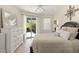 Bright main bedroom with lanai access and plenty of natural light at 8956 Stone Harbour Loop, Bradenton, FL 34212