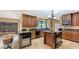 Gourmet kitchen with custom cabinets, granite countertops, and modern stainless steel appliances at 940 Siesta Key Pl, Sarasota, FL 34242