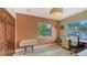 Home office with a closet, work desk, and a large window with outdoor views at 940 Siesta Key Pl, Sarasota, FL 34242
