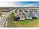 A high angle view of a meticulously kept property showcasing a beautifully landscaped lawn at 12343 Halfmoon Lake Ter, Bradenton, FL 34211