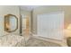 The bedroom has an ensuite bathroom and large closet at 12343 Halfmoon Lake Ter, Bradenton, FL 34211