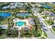 Community amenities including a pool, tennis court, park, and picturesque ponds enhancing community charm at 12343 Halfmoon Lake Ter, Bradenton, FL 34211