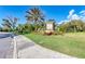 A welcoming community entrance with lush landscaping and clear signage. Eagle Trace Community Sign at 12343 Halfmoon Lake Ter, Bradenton, FL 34211
